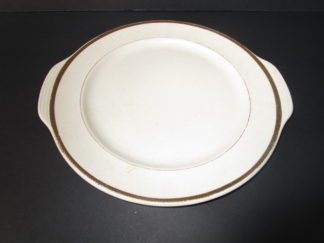 white plate with small handle