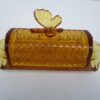 Amber glass butterfly butter dish.