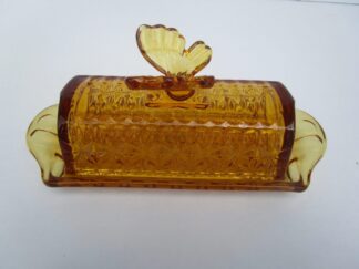 Amber glass butterfly butter dish.