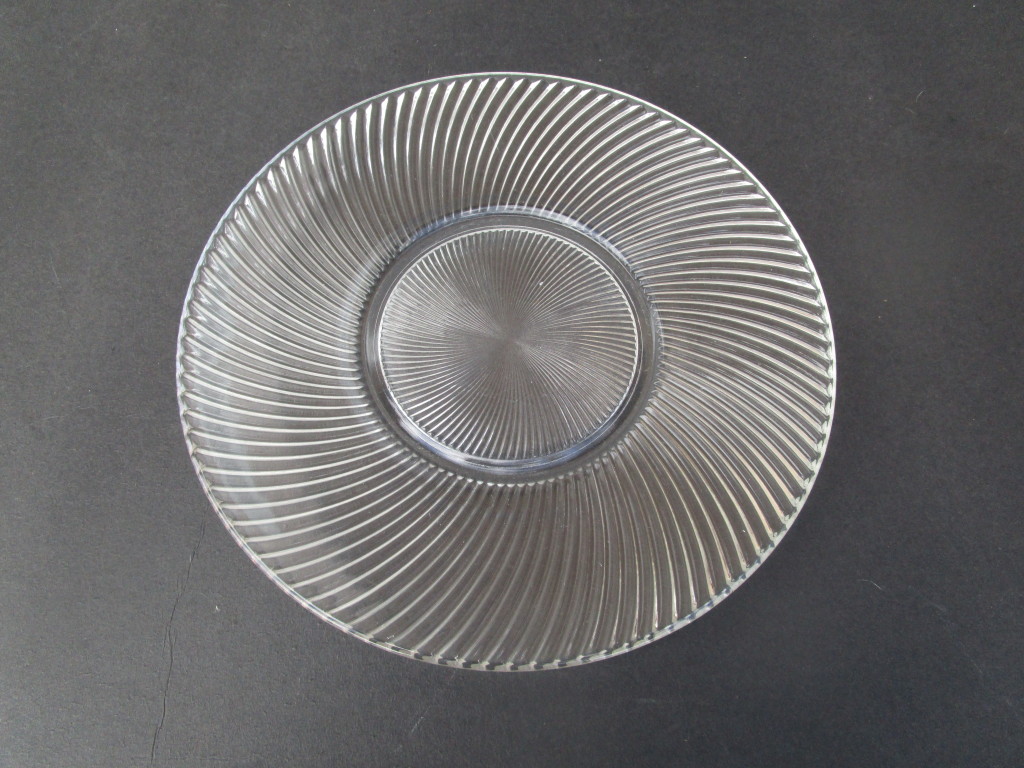 Swirl Glass Platter costs USD 8.99 each