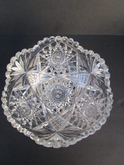 Cut glass bowl with starburst pattern.