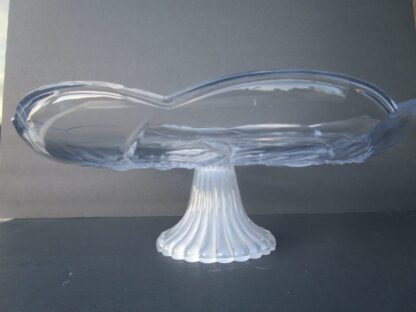 Clear glass pedestal serving bowl.