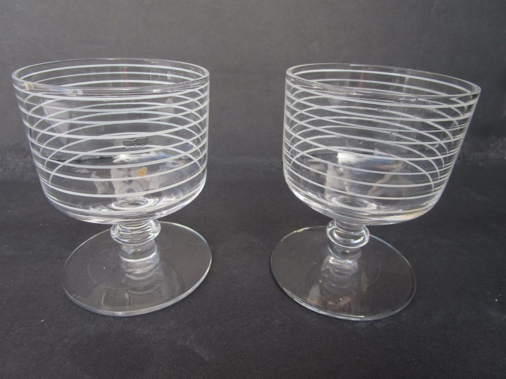 Shot glasses with white enameled ringed bowls