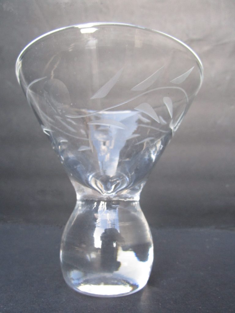 Shot glass on a low, hefty bulbous stem