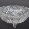 Cut glass footed bowl with intricate design.