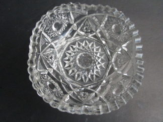 Cut glass bowl with starburst design.