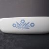 White baking dish with blue flowers.