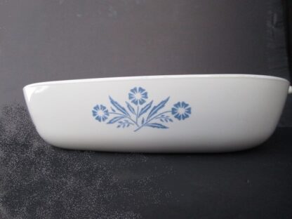 White baking dish with blue flowers.