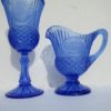 A commemorative footed goblet and pitcher set