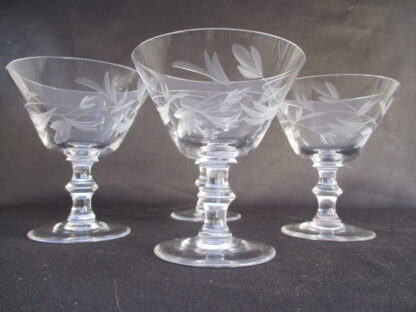 four-piece clear wine glass set with etched foliage