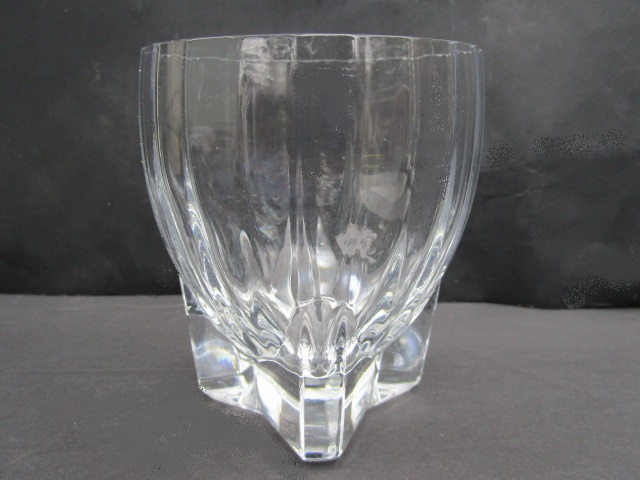 Close shot of a glass tumbler with wide base