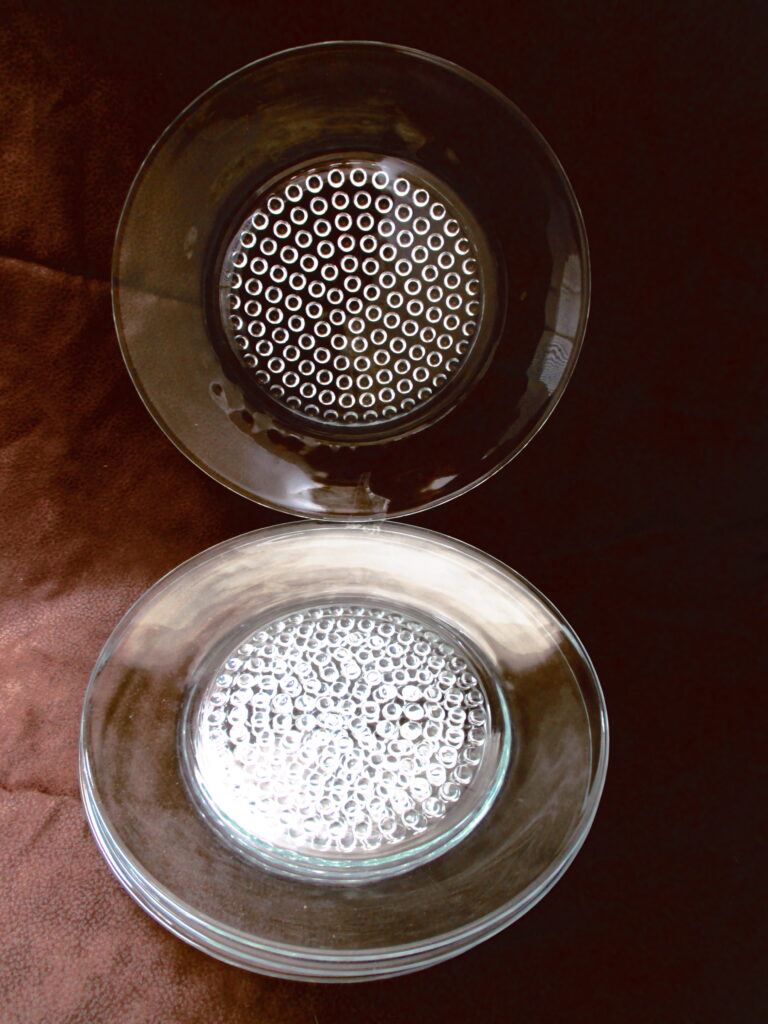 Glass Plates with beaded base on the underside