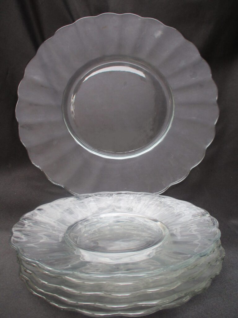 Five glass flower form plates available for sale