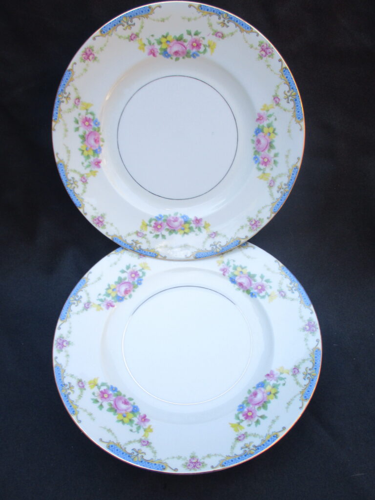 Two plates with a floral design on them.