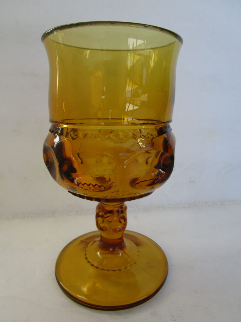 Amber color Designer glass with circular base
