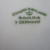 A close up of the name of a plate