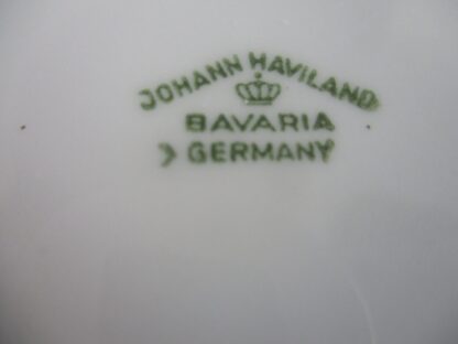 A close up of the name of a plate