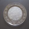 A clear plate with flowers on it
