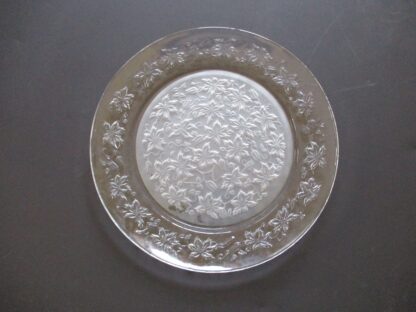 A clear plate with flowers on it