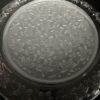 A close up of the bottom of a glass plate